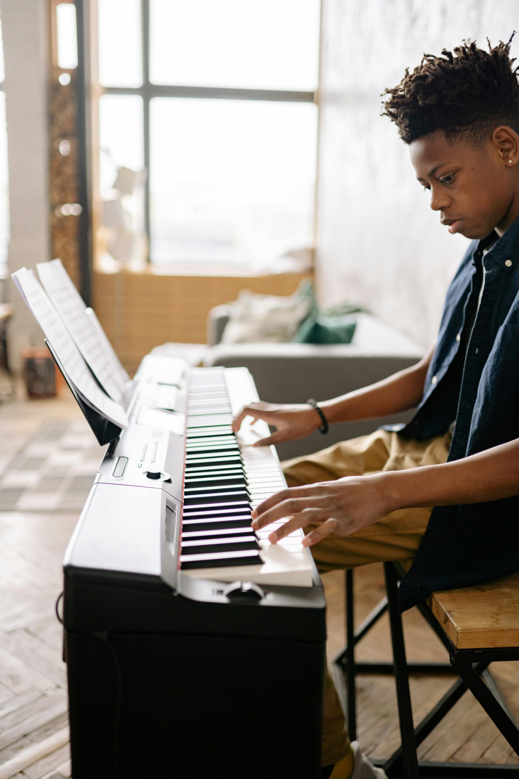 a man reading piano music